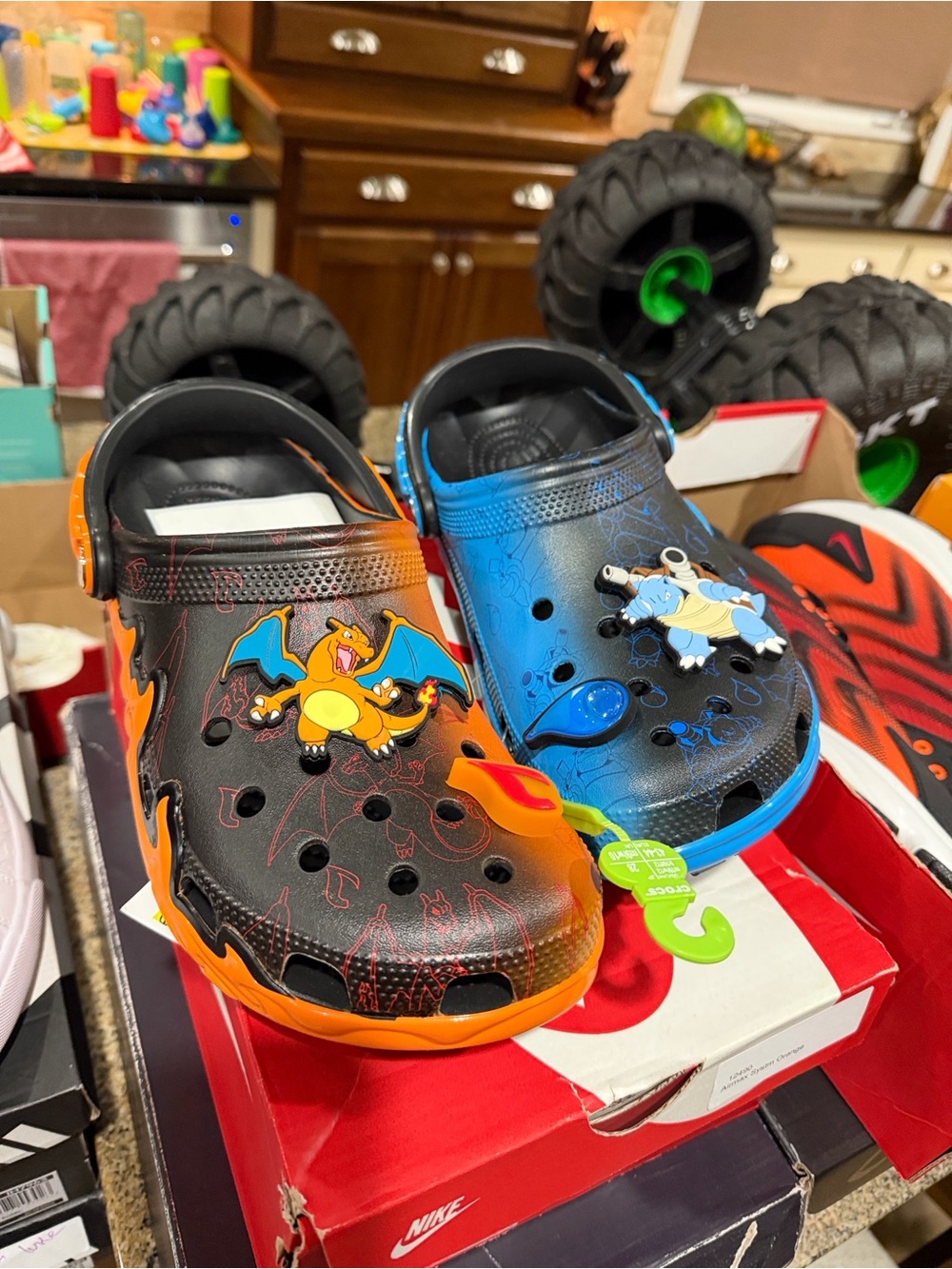 Brand New 10M Charizard vs. Blastoise Crocs - Black/Orange/Blue w/Charms